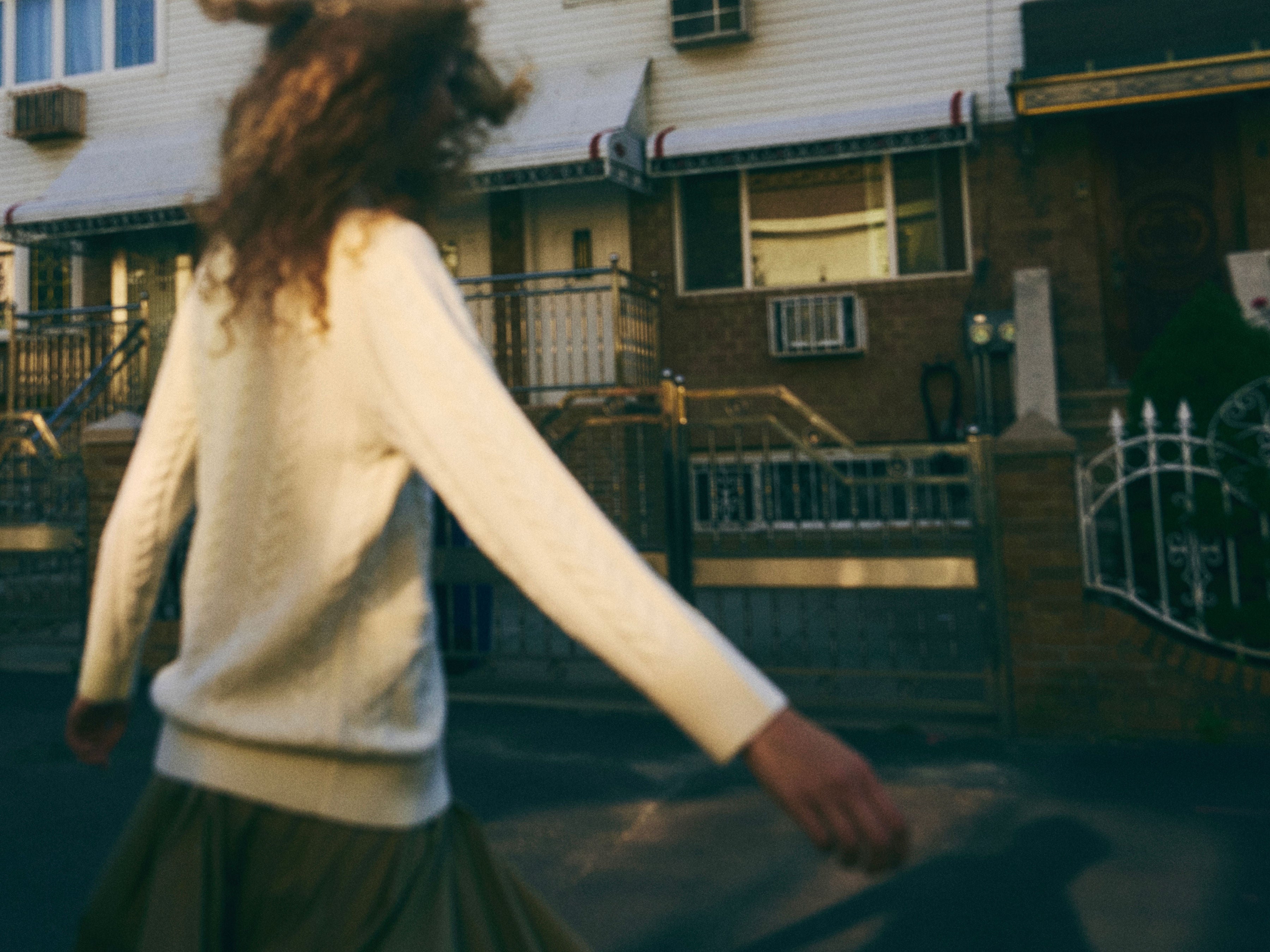 Sanmiguelito cardigan in Cream — Extrafine Merino wool, relaxed fit, styled over dress