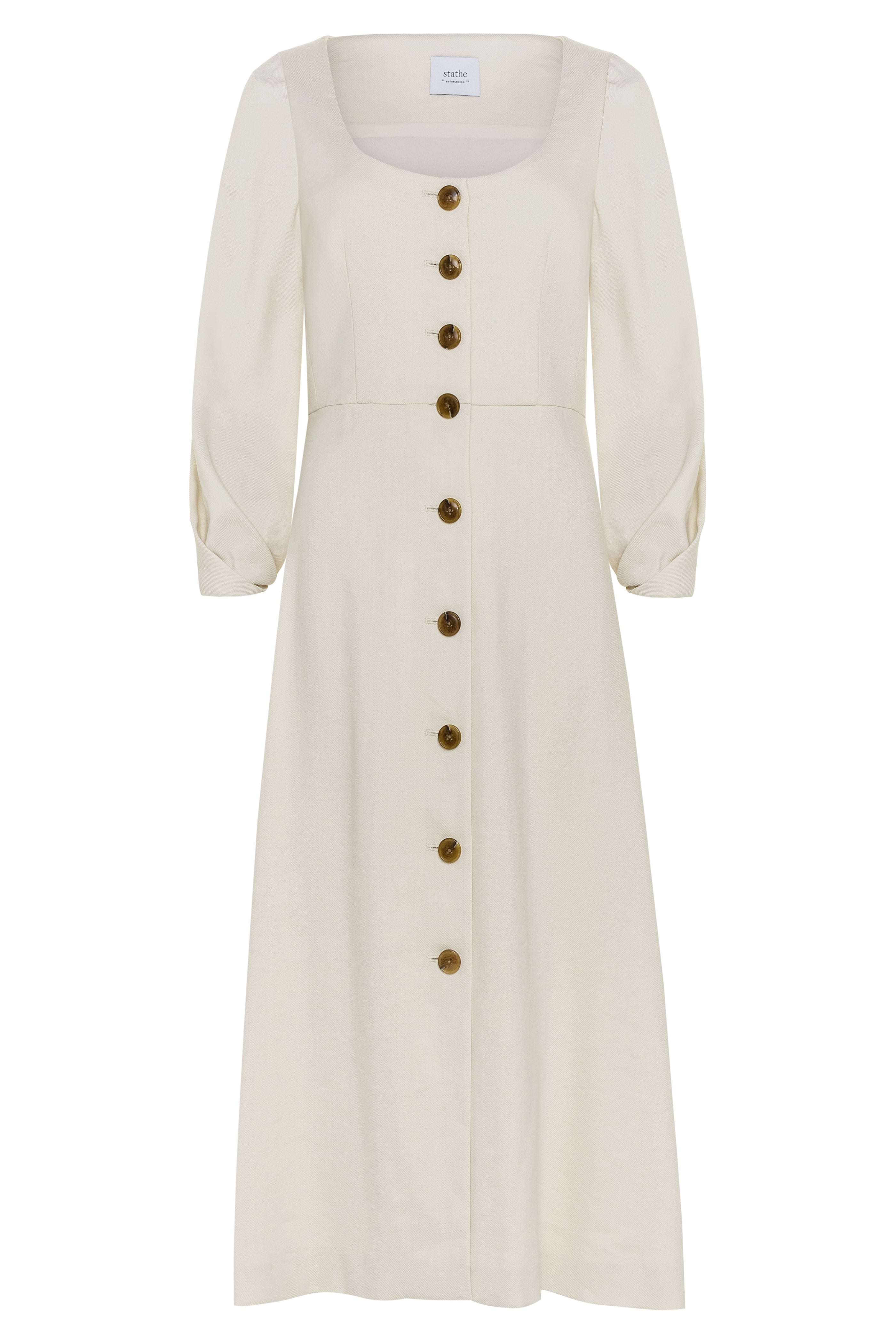 Alamo Dress in Alabaster — sleek Italian linen twill with slight natural stretch, seamed natural waist, sculpted three-quarter sleeves, button-front closure, above-ankle length, flat lay front