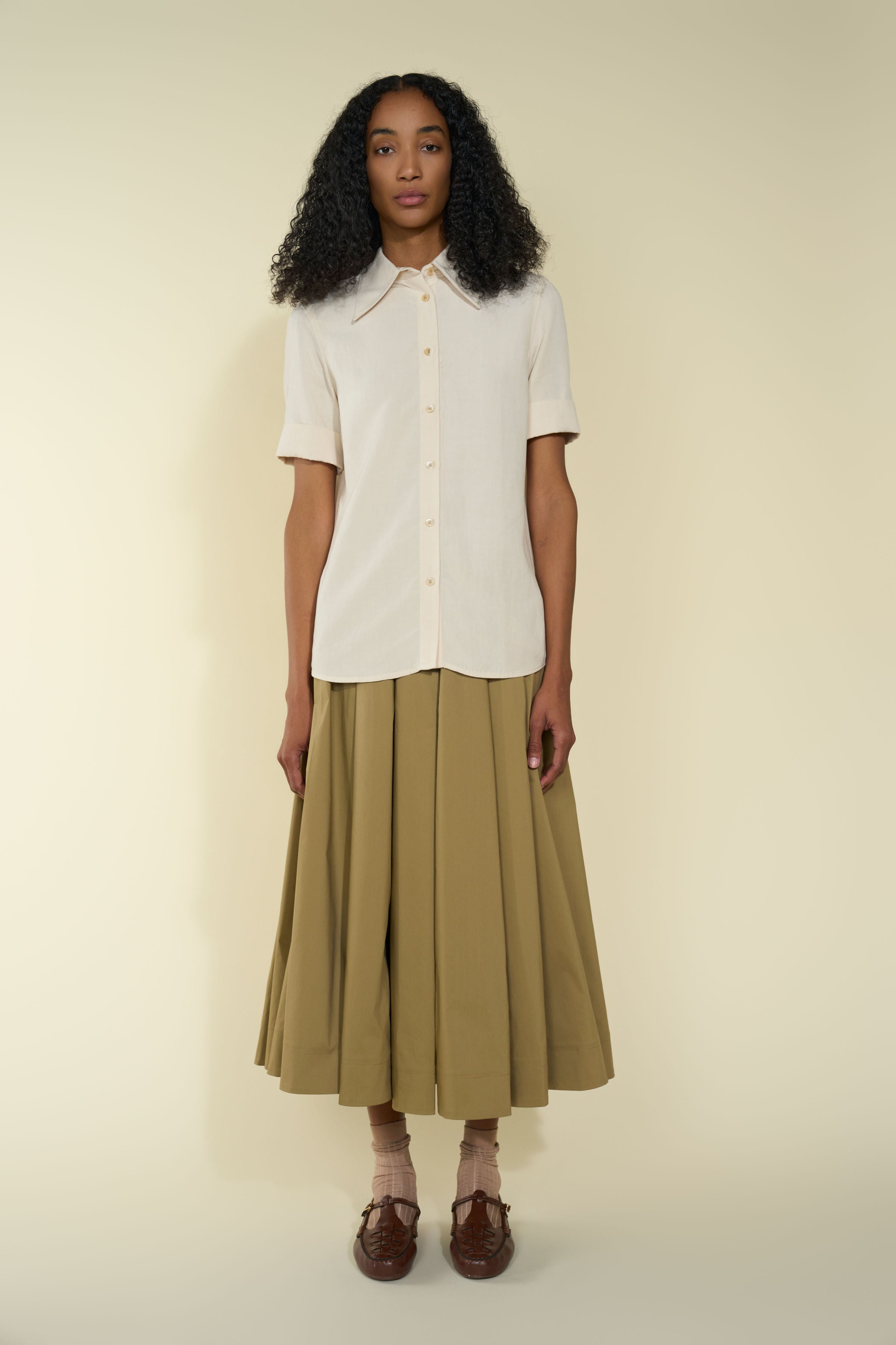 Chicura Shirt in Gesso — Japanese close-weave linen blend, pointy collar, folded short sleeves, versatile styling piece, back view