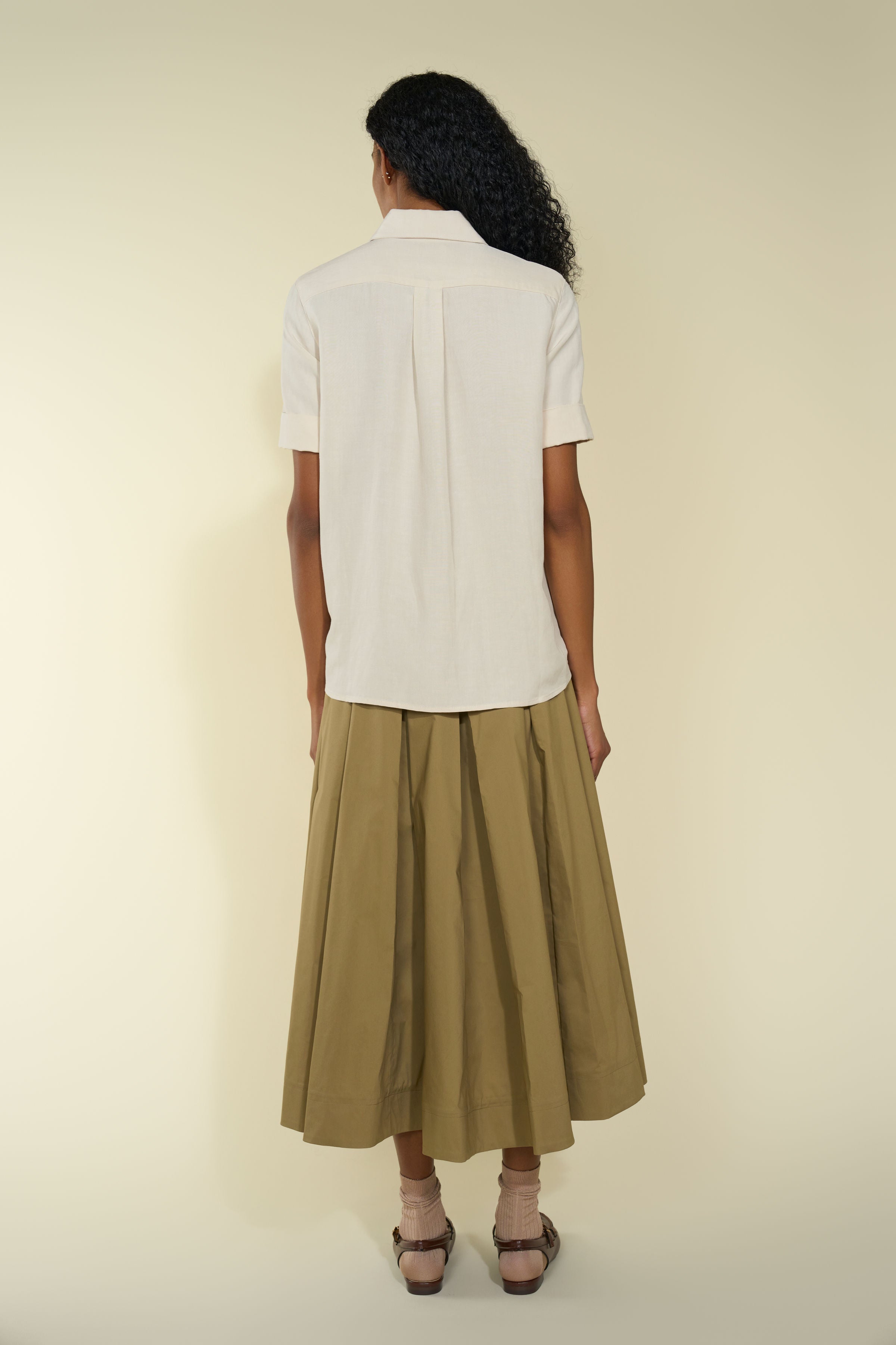 Chicura Shirt in Gesso — Japanese close-weave linen blend, pointy collar, folded short sleeves, versatile styling piece, alternate front view