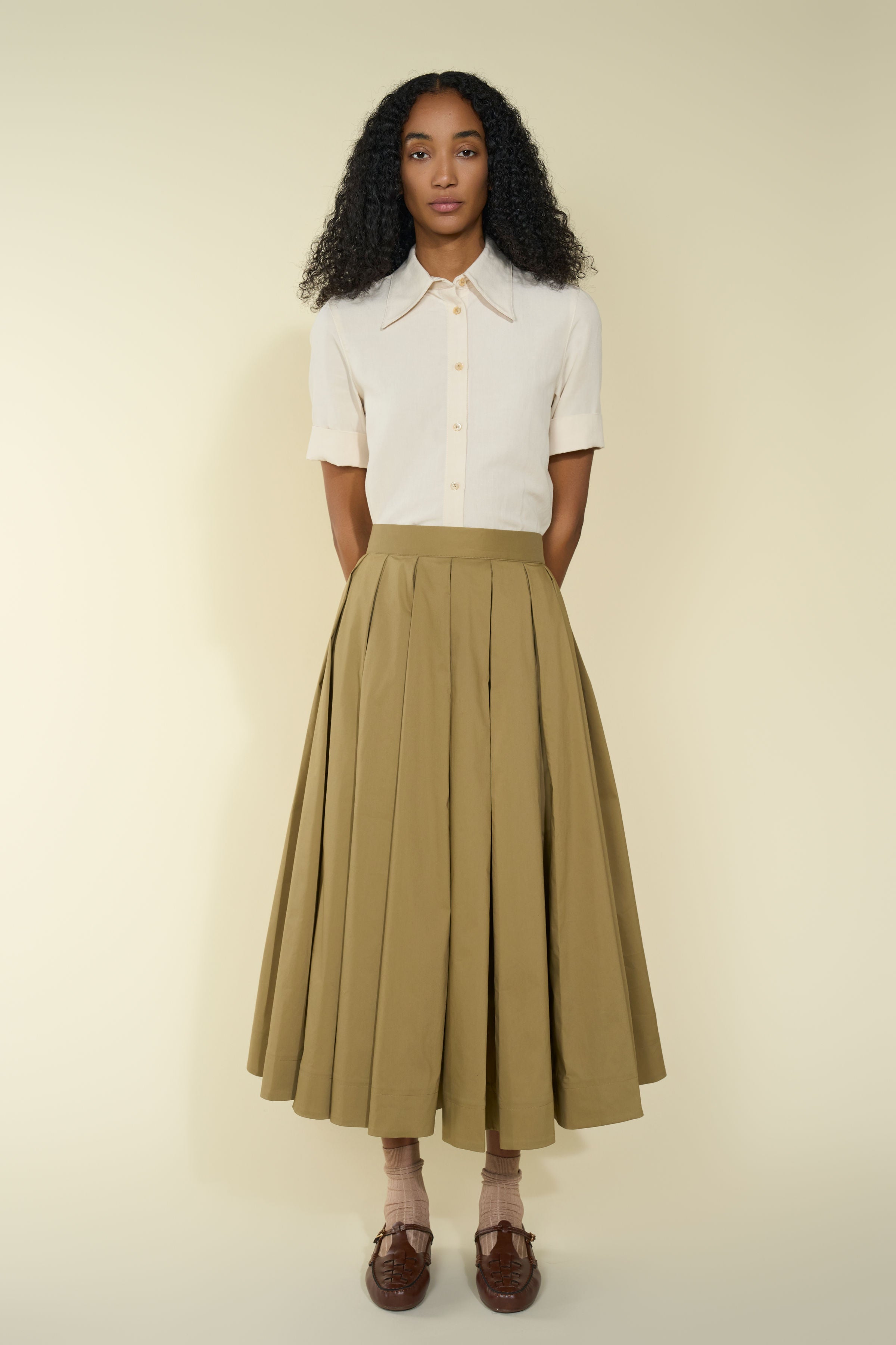 Chicura Shirt in Gesso — Japanese close-weave linen blend, pointy collar, folded short sleeves, versatile styling piece, full-length front view
