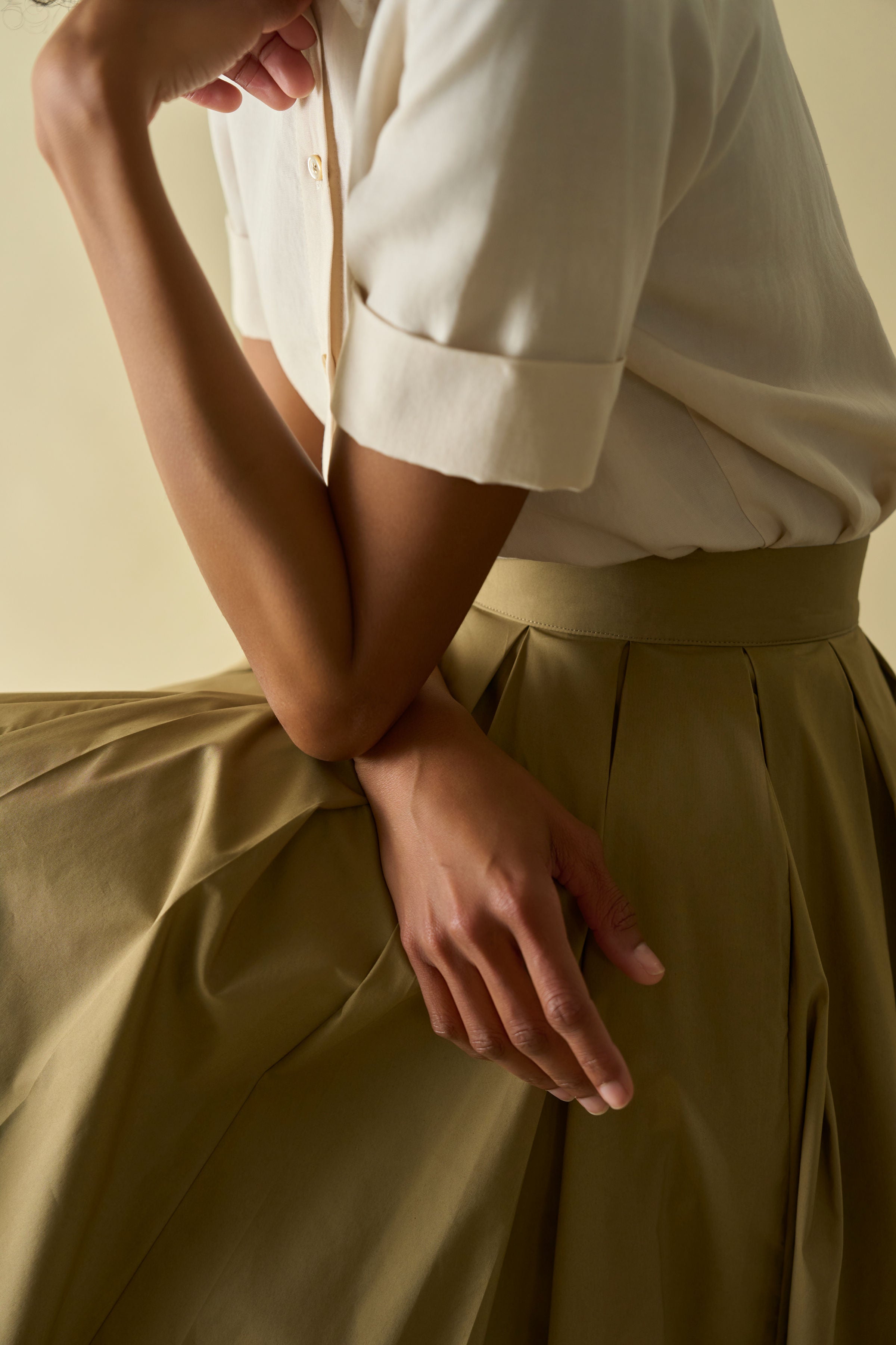 Chicura Shirt in Gesso — Japanese close-weave linen blend, pointy collar, folded short sleeves, versatile styling piece, side view