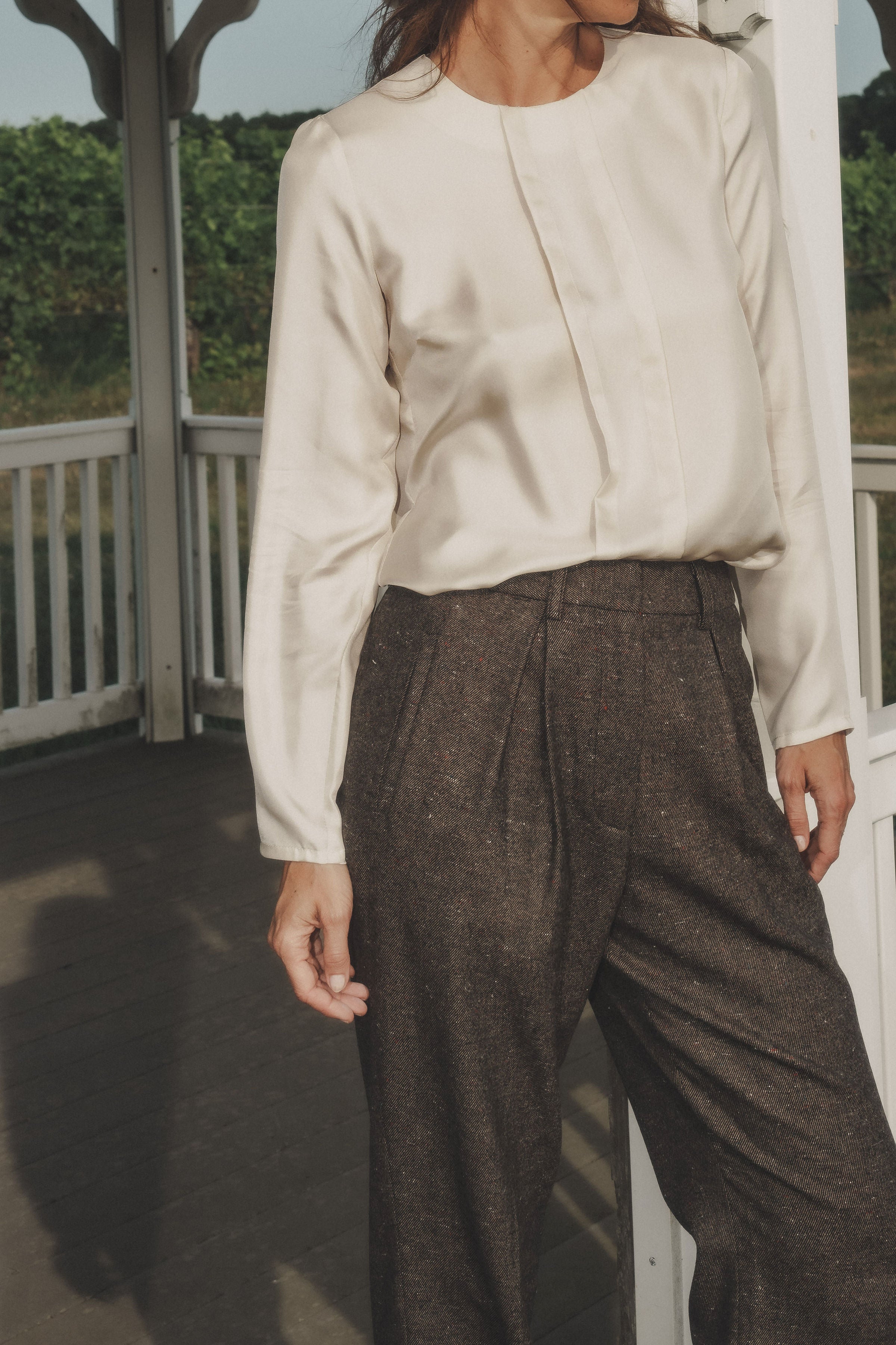 Choya top in Bone — lustrous silk twill, relaxed fit, long straight sleeves, pleated front details, back view