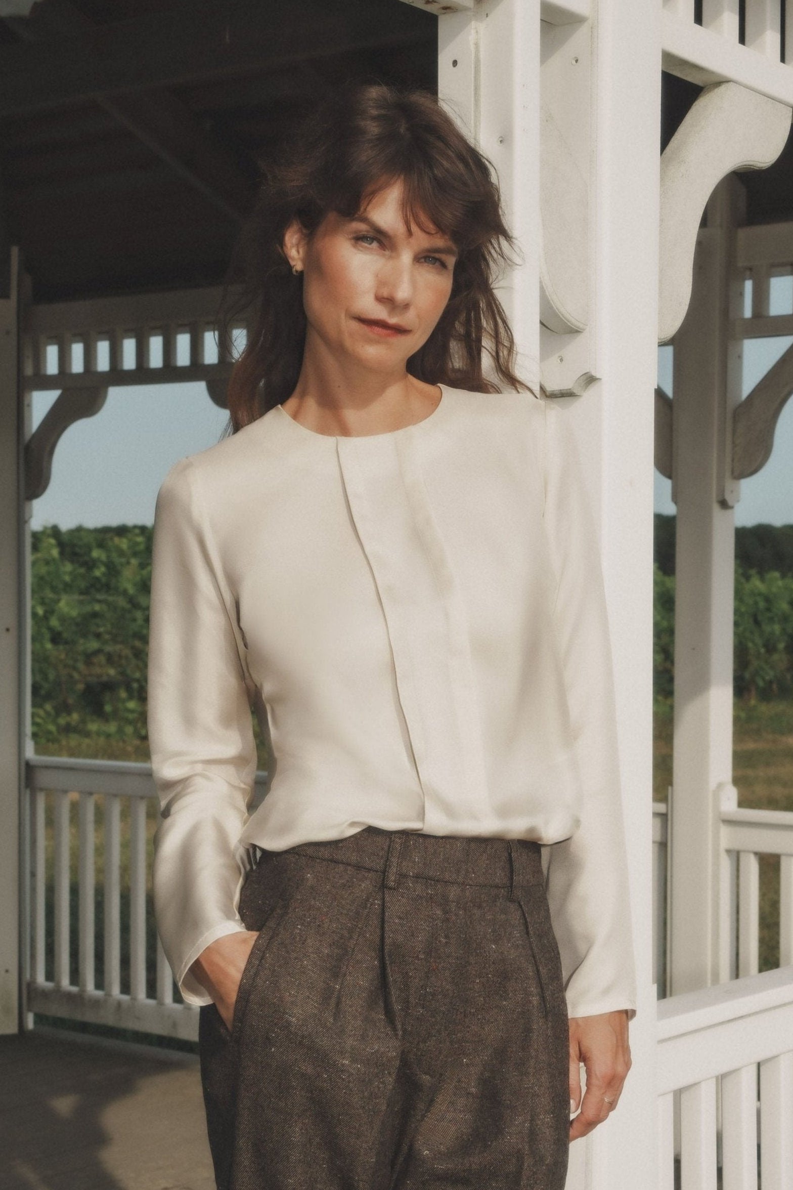 Choya top in Bone — lustrous silk twill, relaxed fit, long straight sleeves, pleated front details, front view
