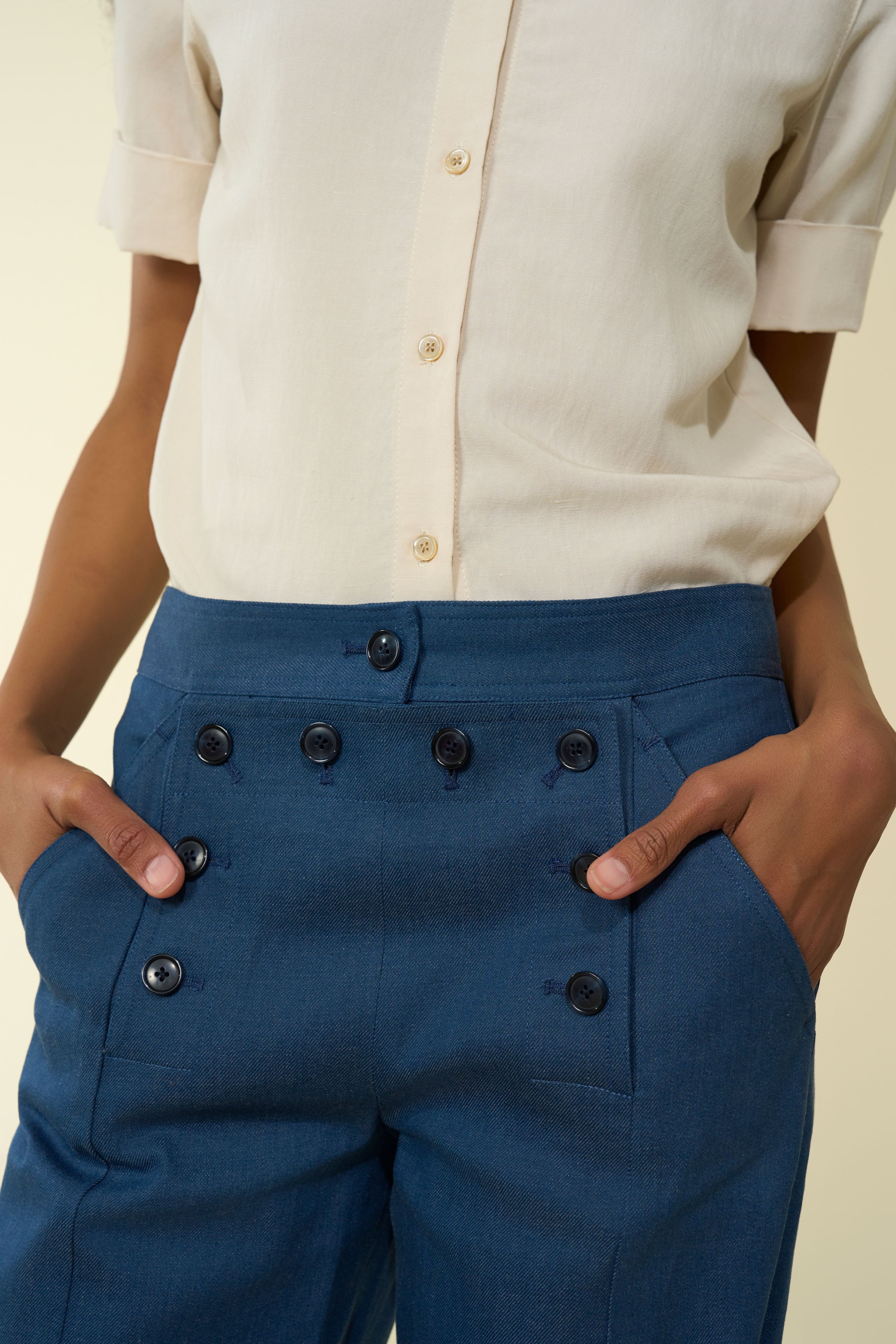 Hecho Pants in Indigo — premium Japanese denim, 70's-inspired style, front button details, mid-waist, wide leg, fabric detail