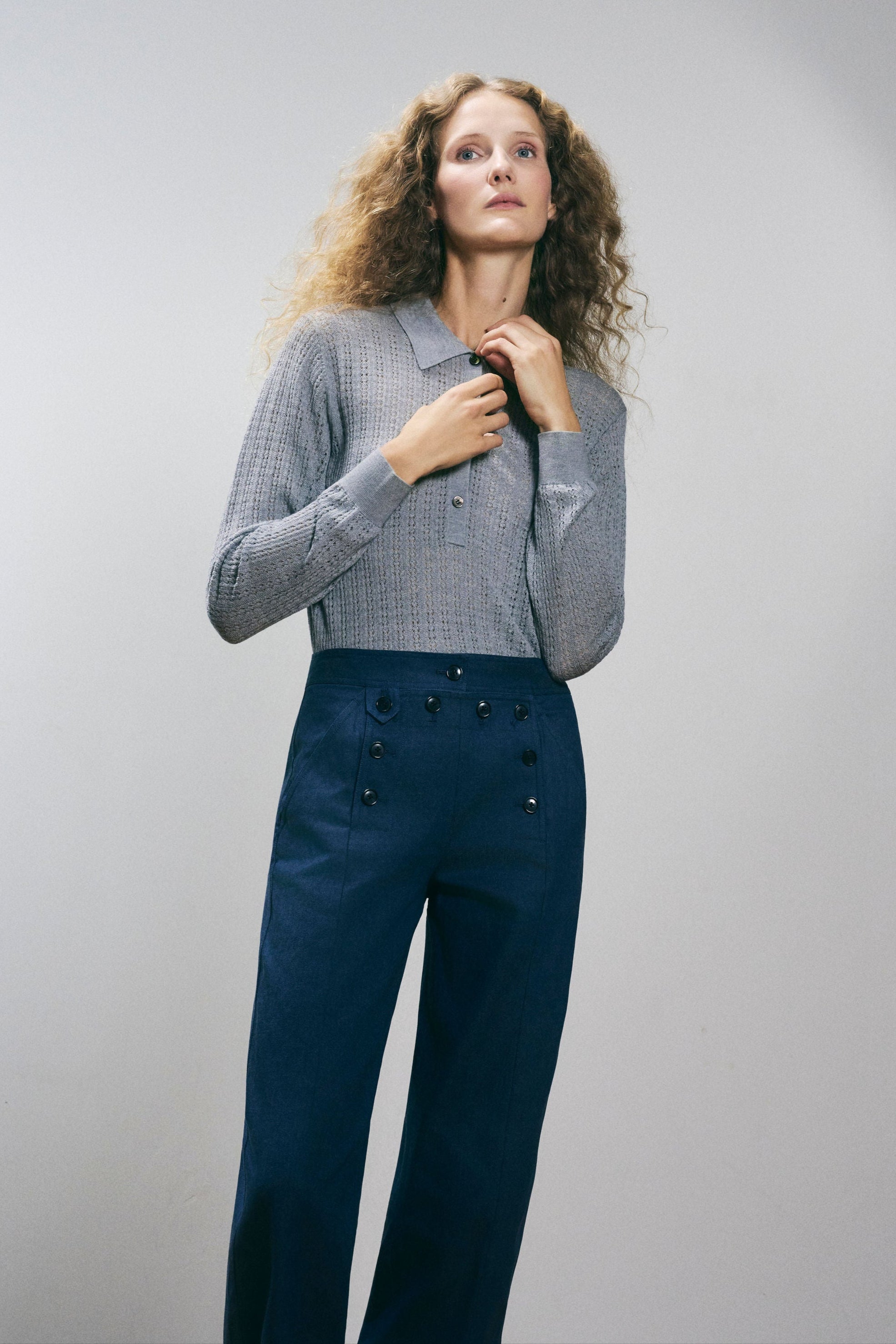 Hecho Pants in Indigo — premium Japanese denim, 70's-inspired style, front button details, mid-waist, wide leg, front closeup