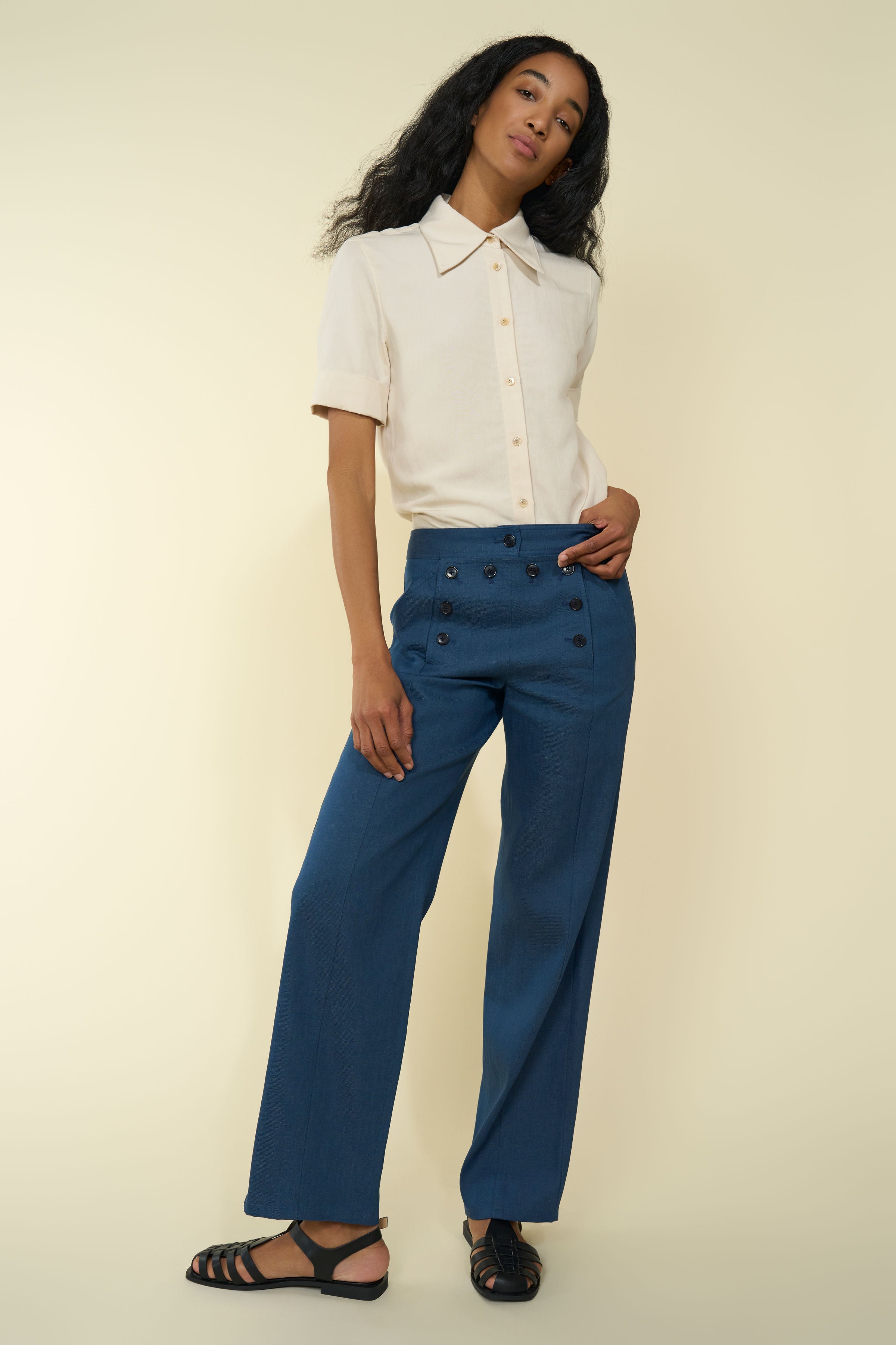 Hecho Pants in Indigo — premium Japanese denim, 70's-inspired style, front button details, mid-waist, wide leg, full-length front view