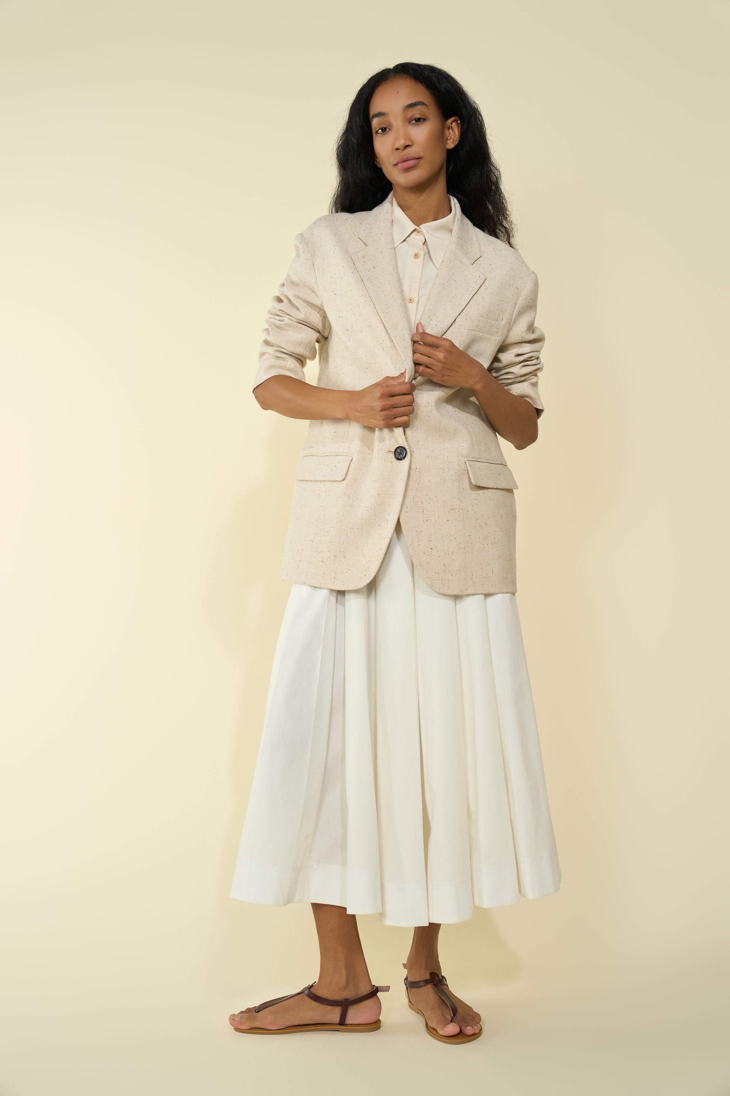 Lightweight Palofierro skirt in White — Japanese cotton, natural waist, above-ankle length, hidden back-zip and button closure, hidden side pockets