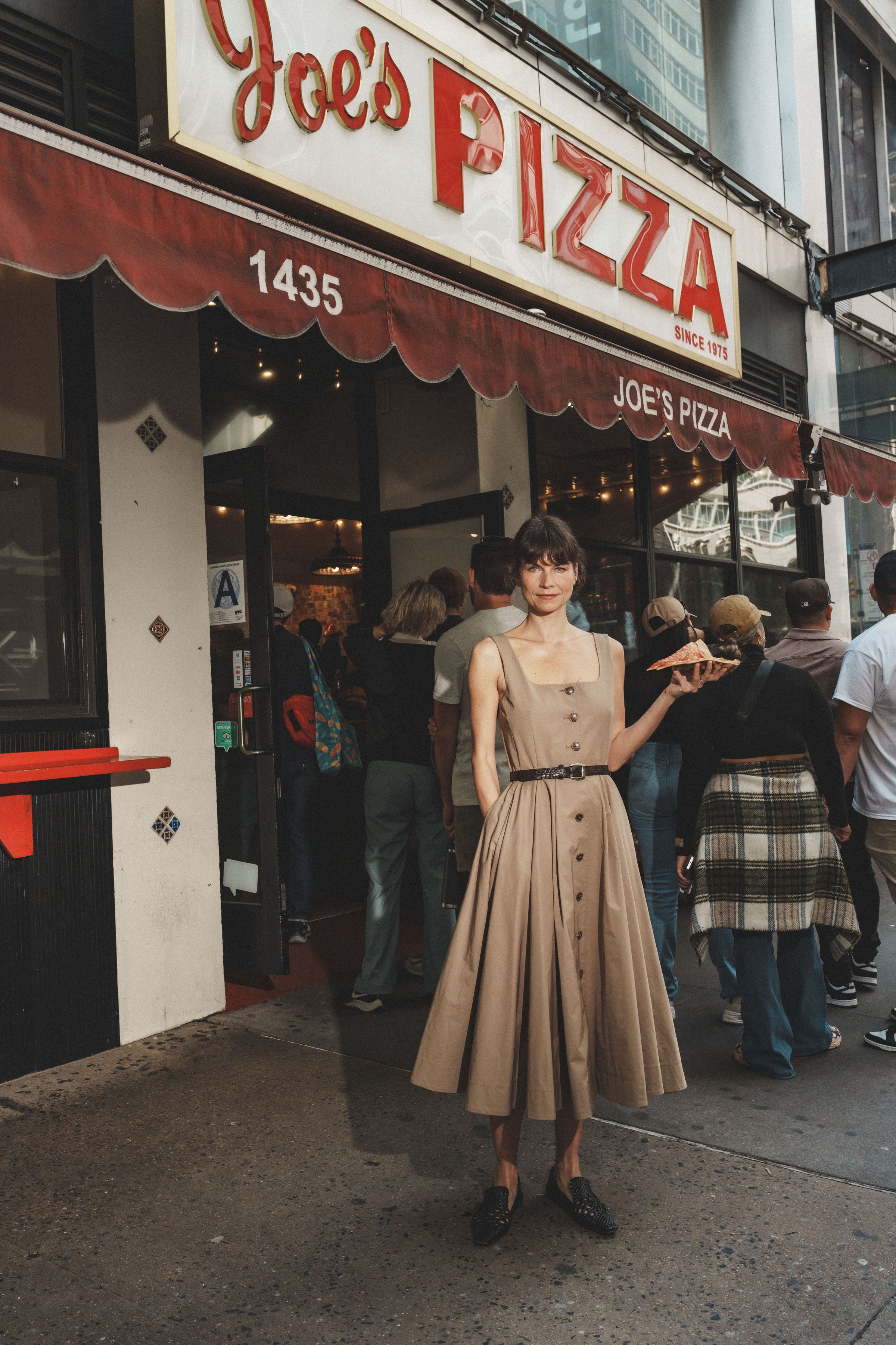 Ocotillo dress in Trench — cotton blend, button-front closure, emphasizes natural waist, above-ankle length, hidden pockets, lifestyle editorial