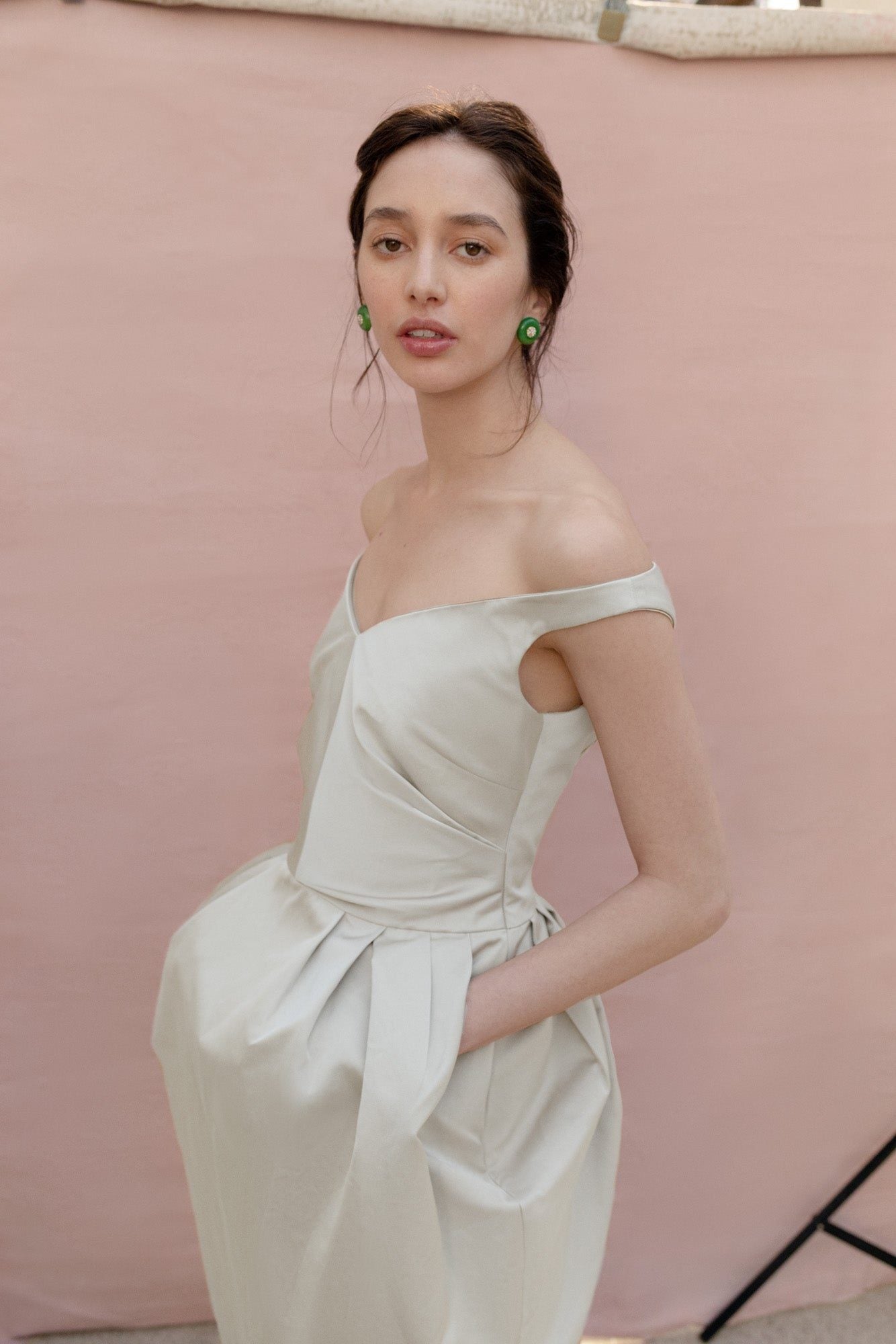 Woman wearing the Stathe Piloncillo Dress in Butter — editorial
