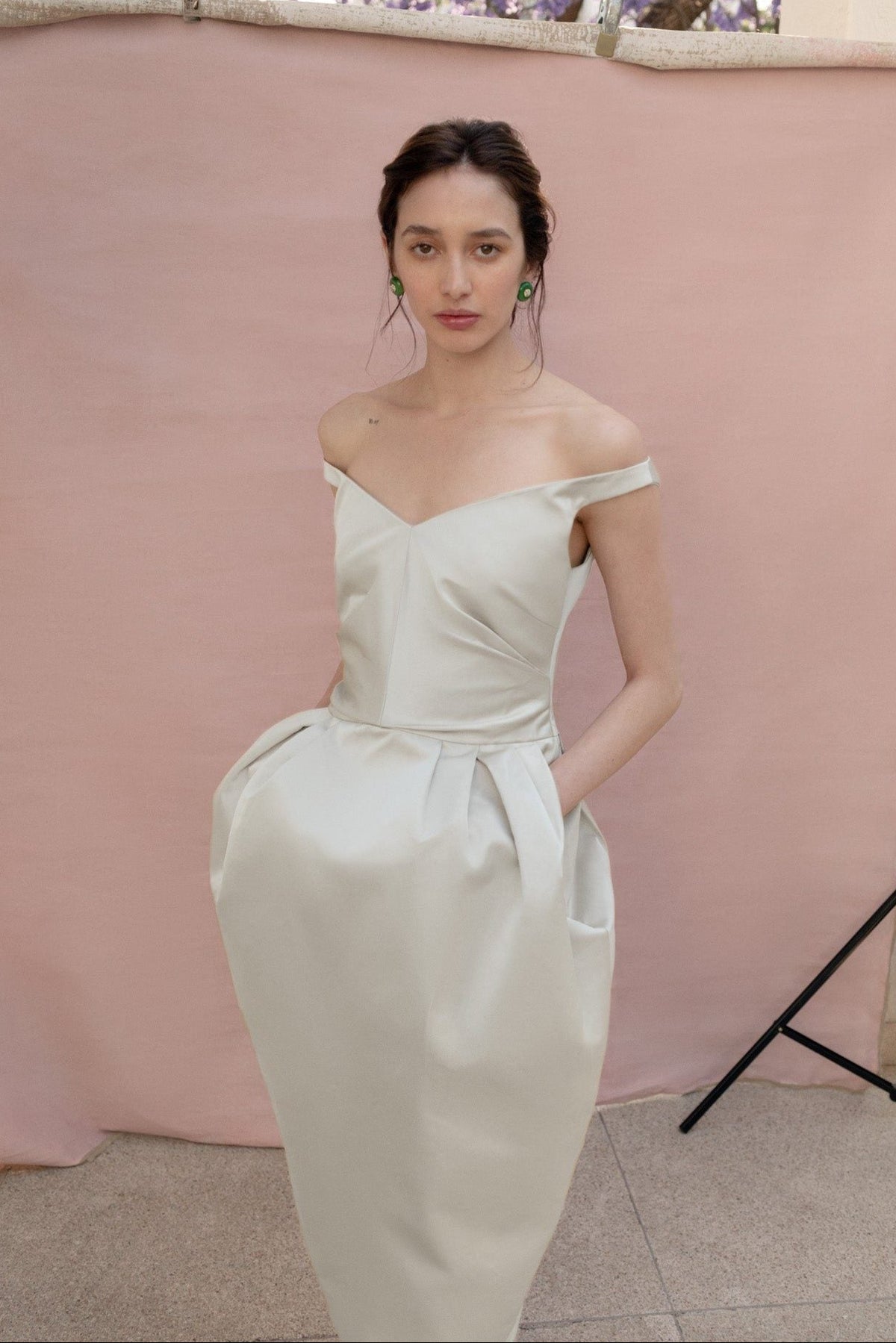 Woman wearing the Stathe Piloncillo Dress in Butter — editorial