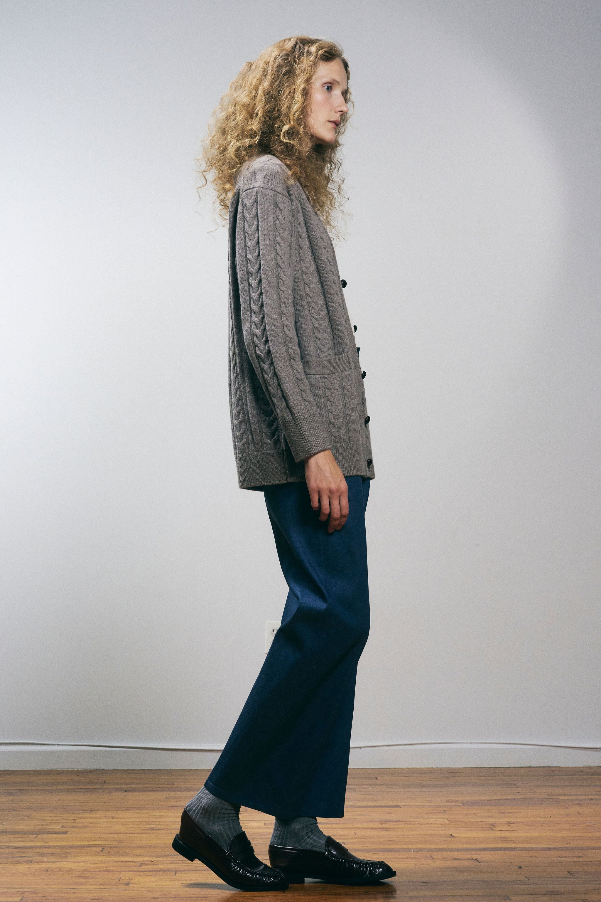 Sanmiguelito cardigan in Heather Brown — 100% Extrafine Merino wool, horseshoe cable and rib knit pattern, dropped shoulder, ribbed cuffs and hem, dark brown leather buttons, below-waist length, full-length front view