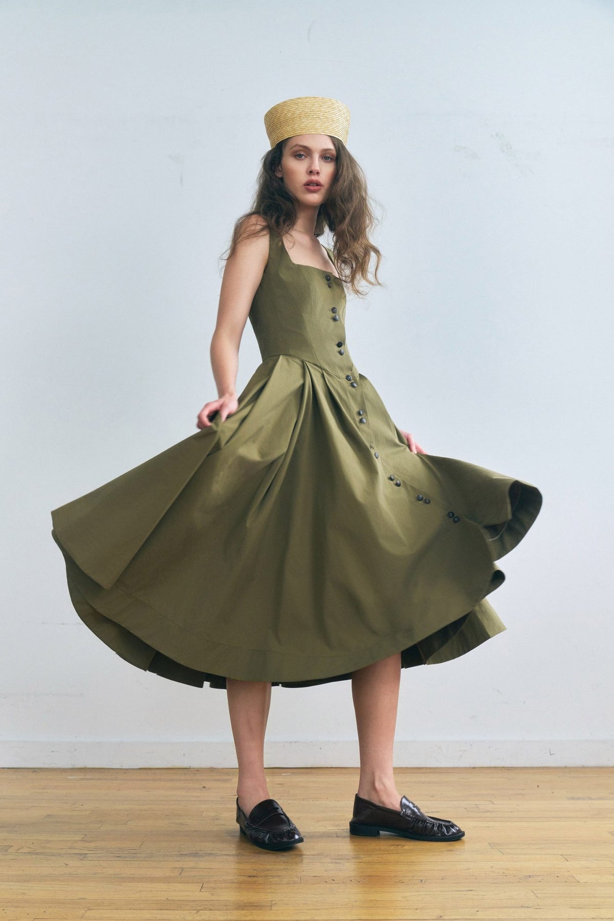 Stathe Toloache Dress in Mosswood — full A-line skirt in motion